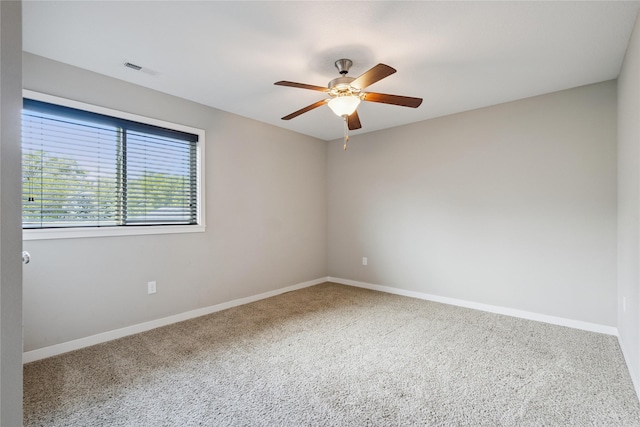 16924 Prairie Dr, Clive, IA 50325 - carpeted empty room featuring ceiling fan and baseboards