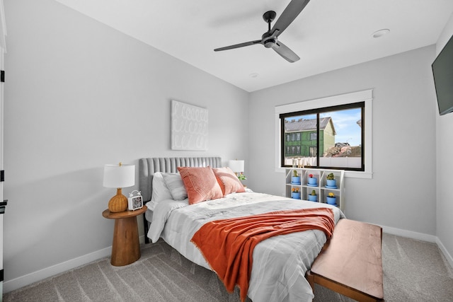 bedroom featuring carpet, baseboards, and ceiling fan