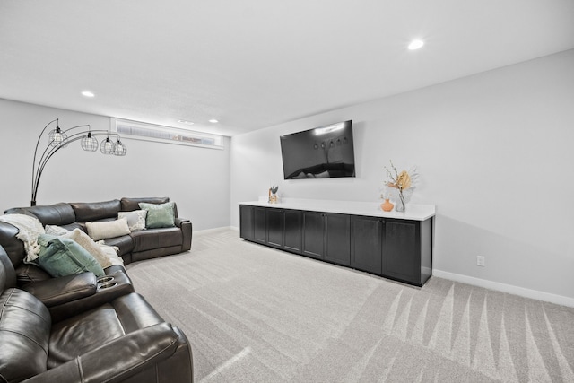 living room featuring carpet flooring, recessed lighting, and baseboards