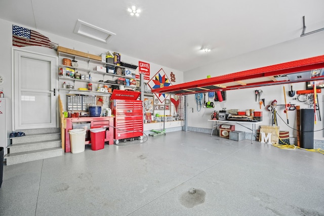 garage with a workshop area