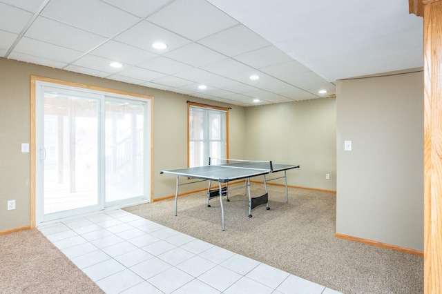 rec room featuring a drop ceiling, recessed lighting, baseboards, and carpet