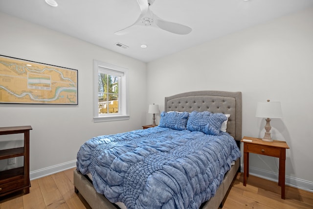 bedroom featuring hardwood / wood-style flooring and ceiling fan