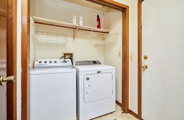 laundry area featuring independent washer and dryer