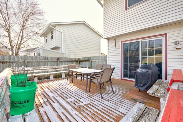 wooden terrace with grilling area