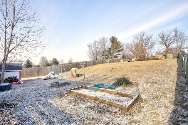 view of yard with a playground