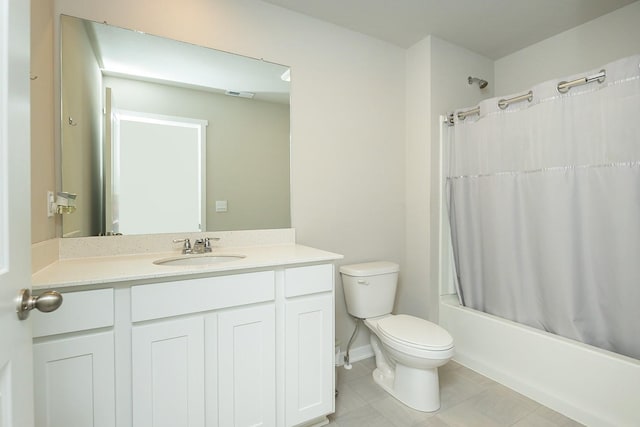 full bathroom with vanity, tile patterned floors, toilet, and shower / tub combo with curtain