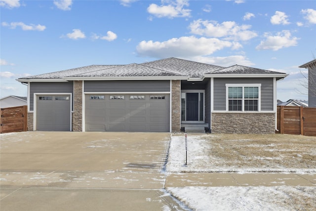 prairie-style house featuring a garage