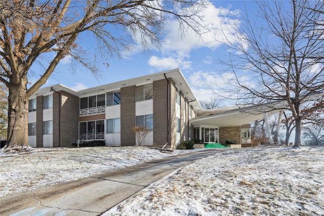 view of snow covered building