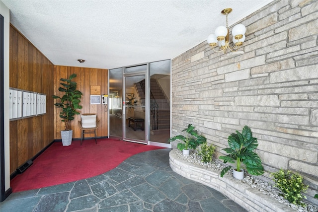 doorway to property with a patio