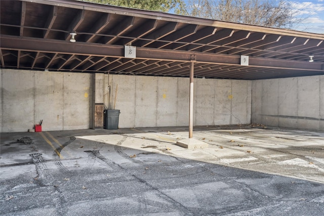 garage featuring a carport