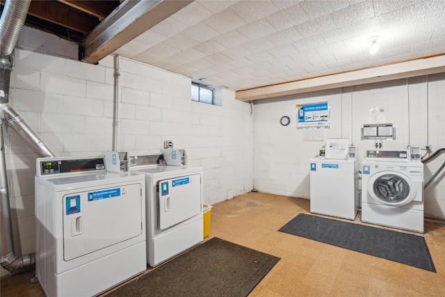 laundry room featuring independent washer and dryer