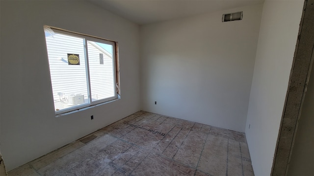 empty room featuring plenty of natural light