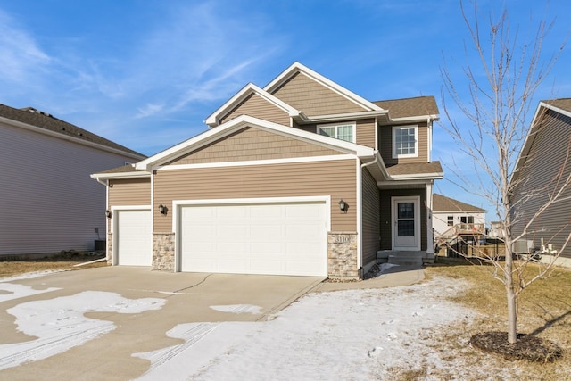 view of front of property featuring a garage