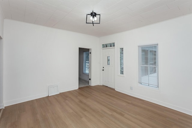 empty room featuring hardwood / wood-style flooring