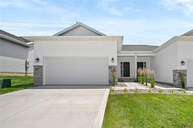 ranch-style house with cooling unit, a garage, and a front lawn