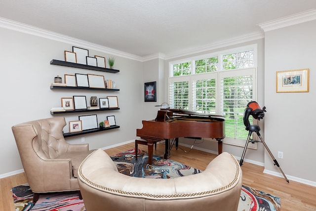 living area with crown molding and wood-type flooring