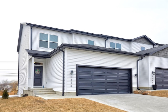 view of front of home with a garage