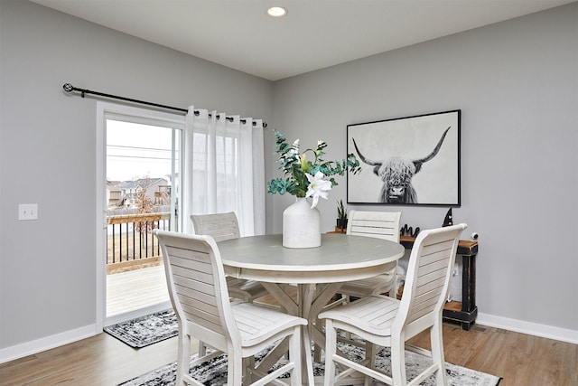 dining room featuring hardwood / wood-style flooring