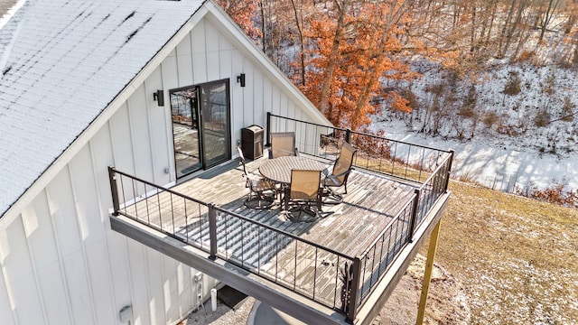 view of snow covered deck