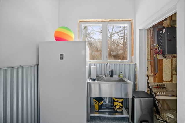 interior space featuring sink and electric panel