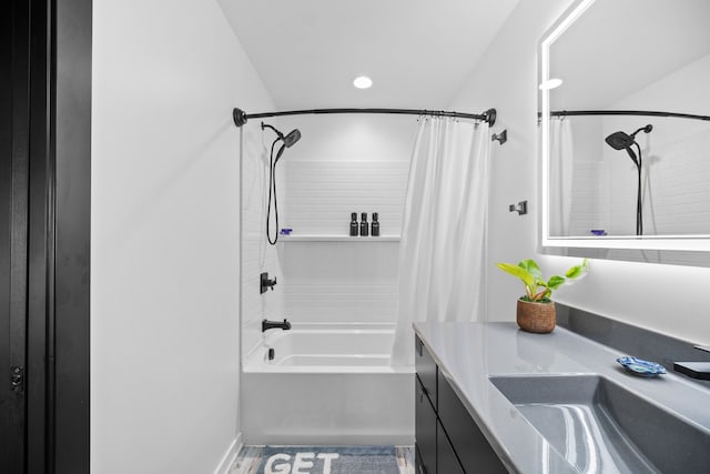 bathroom with vanity and shower / bath combo with shower curtain