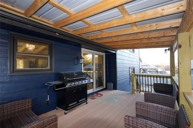 wooden deck with grilling area