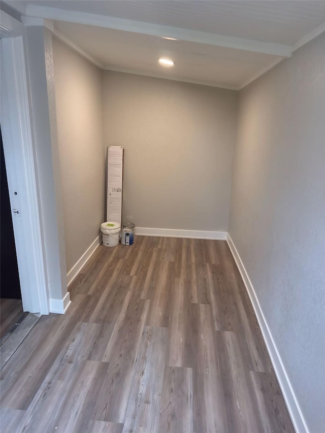 laundry room with baseboards, recessed lighting, wood finished floors, and ornamental molding