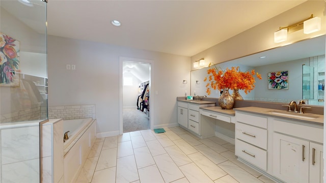 bathroom with vanity and a bathtub