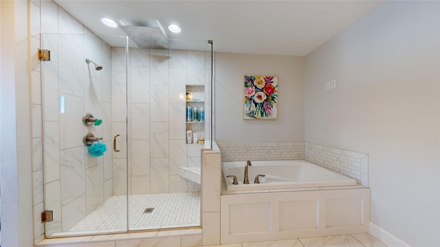 bathroom with tile patterned flooring and independent shower and bath