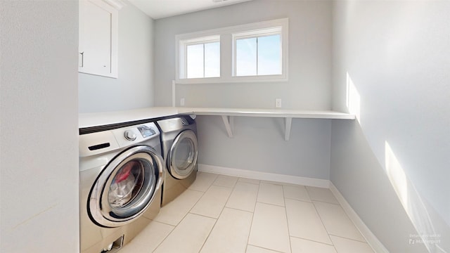 washroom featuring washing machine and clothes dryer