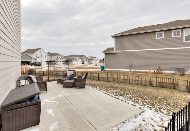 view of patio / terrace with cooling unit and an outdoor hangout area