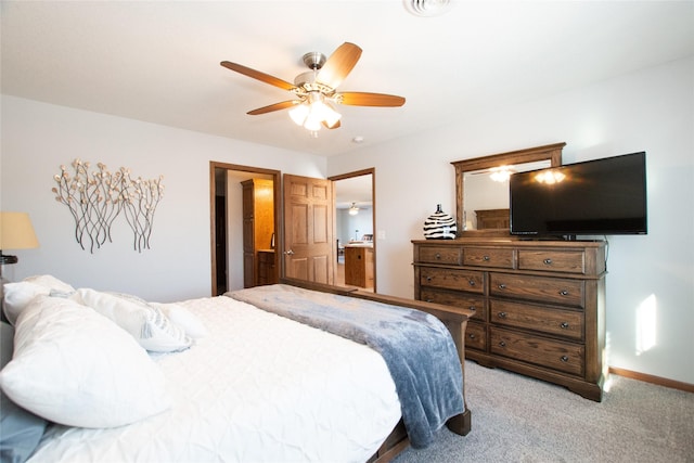 bedroom featuring light carpet and ceiling fan