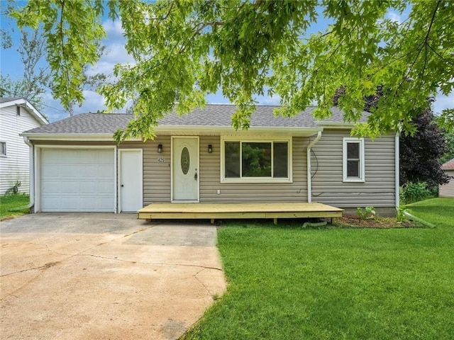 single story home with a garage and a front yard