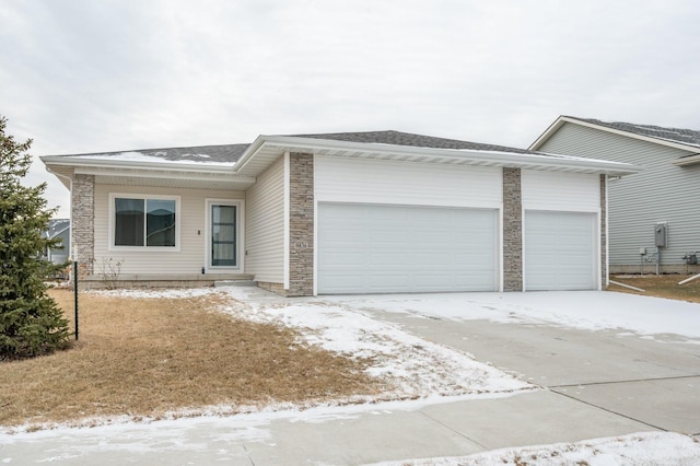 ranch-style home with a garage