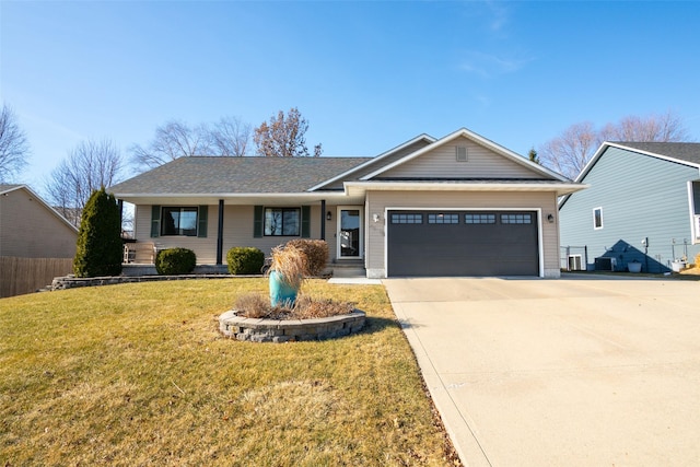 ranch-style home featuring a garage and a front yard