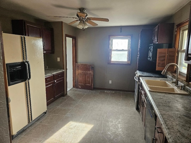 kitchen with sink, ceiling fan, electric range, white fridge with ice dispenser, and stainless steel dishwasher