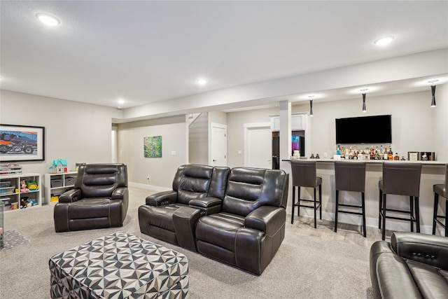 carpeted living room featuring indoor bar