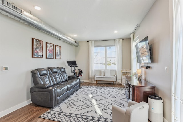 living room with dark hardwood / wood-style floors