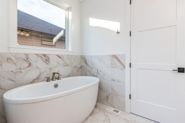 bathroom featuring a bathing tub