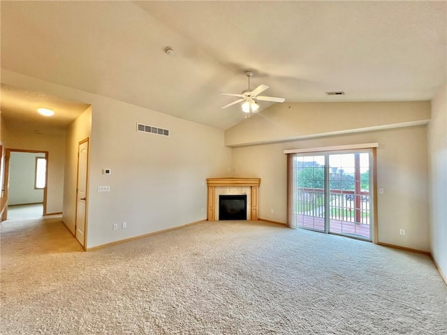 unfurnished living room with ceiling fan, lofted ceiling, and light carpet