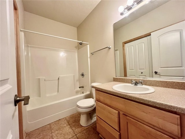 full bathroom with bathtub / shower combination, tile patterned floors, vanity, and toilet