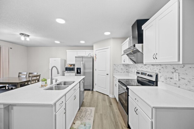10431 Southerwick Pl, Johnston, IA 50131 - kitchen with a sink, light wood-type flooring, white cabinets, and appliances with stainless steel finishes
