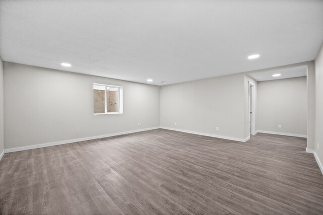 10431 Southerwick Pl, Johnston, IA 50131 - below grade area with baseboards, wood finished floors, and recessed lighting