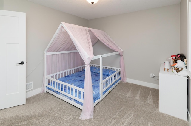 bedroom featuring carpet