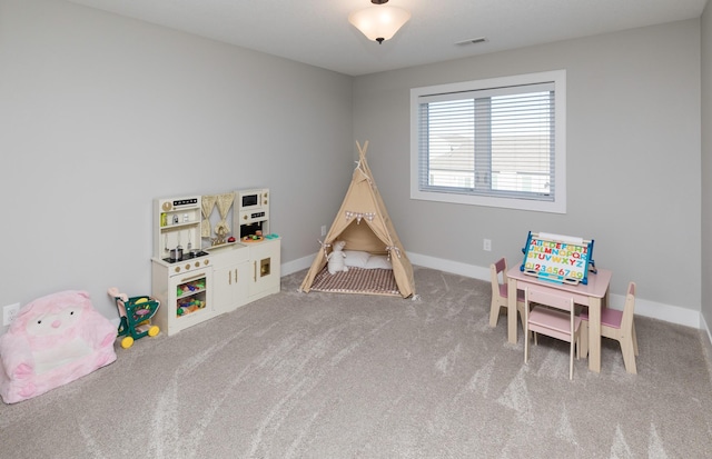 playroom featuring carpet floors