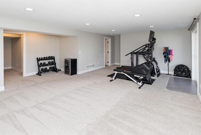 workout room with light carpet