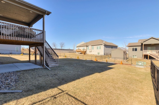 view of yard with a wooden deck