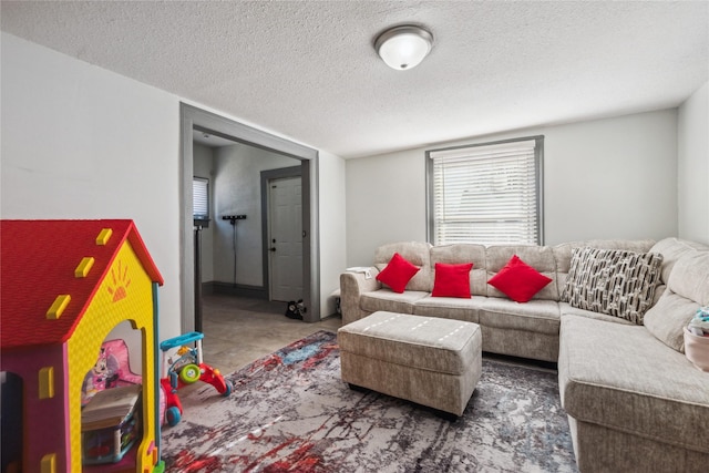 living room with a textured ceiling