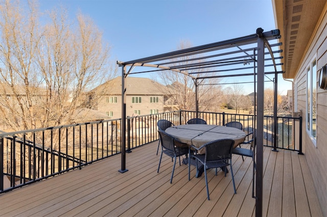 wooden terrace with a pergola