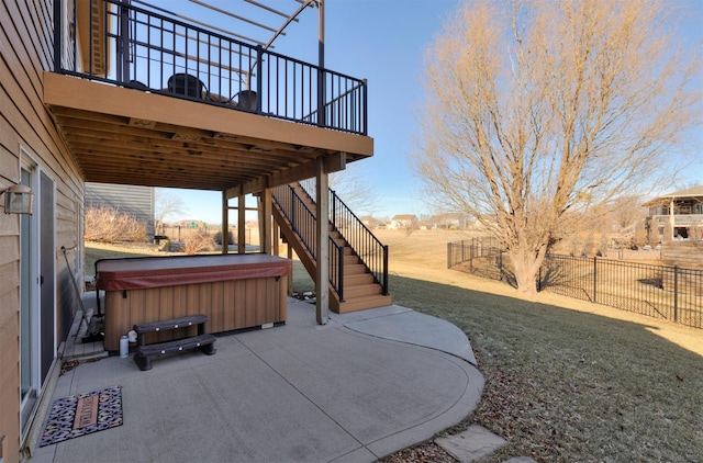 view of patio / terrace with a hot tub